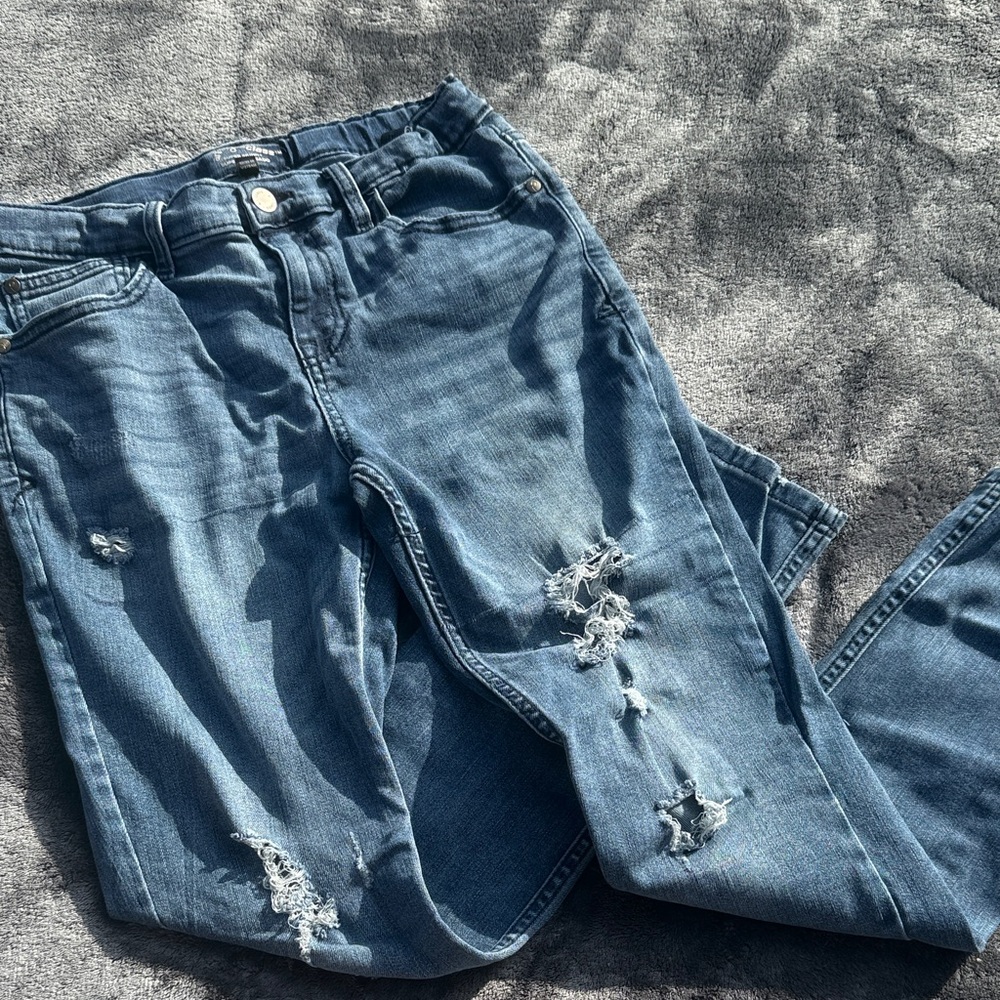 Distressed Blue Jeans